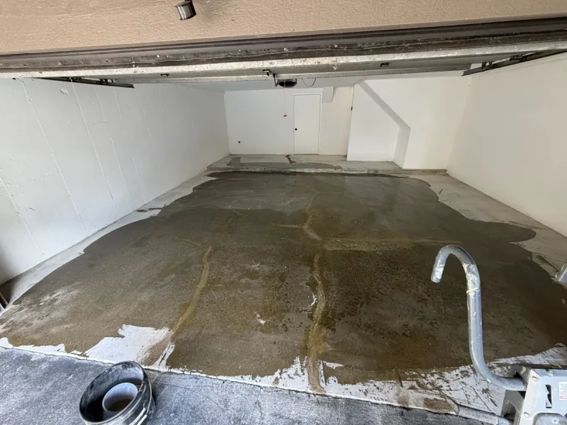 Basement floor before a Comer & Cross coating