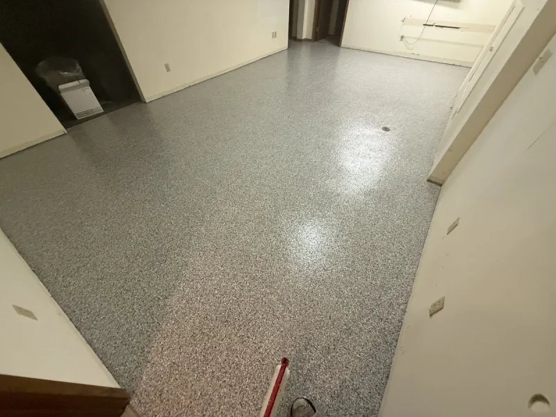 The same basement floor after a Comer & Cross coating