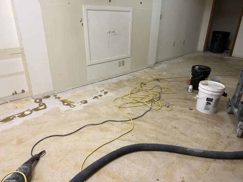 Basement floor before a Comer & Cross coating