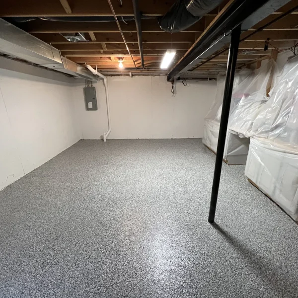 Basement coating project by Comer & Cross