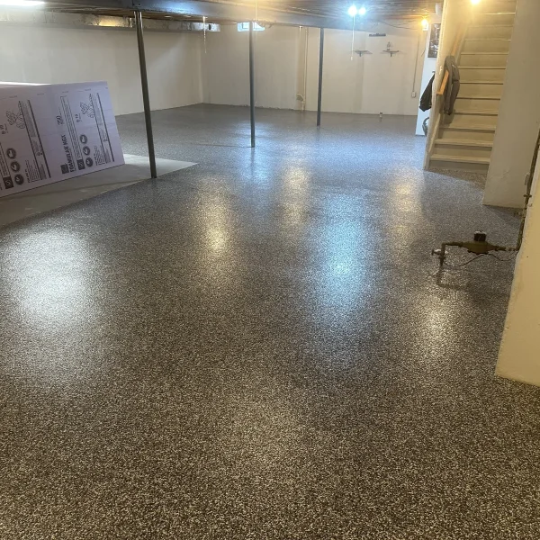 Basement coating project by Comer & Cross
