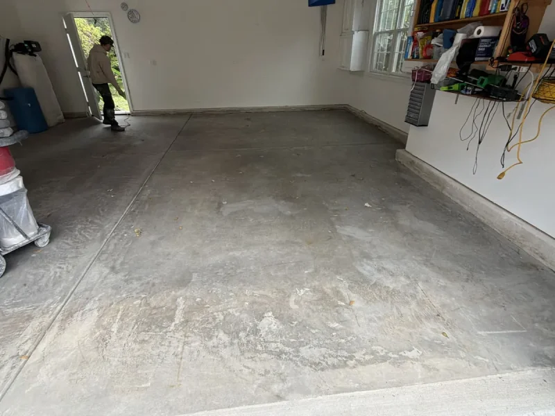 Garage floor before a Comer & Cross coating