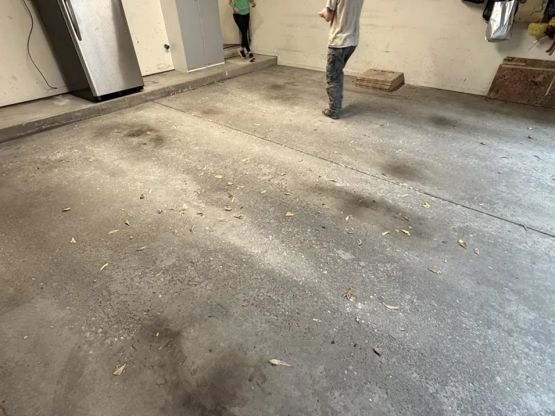 Garage floor before a Comer & Cross coating