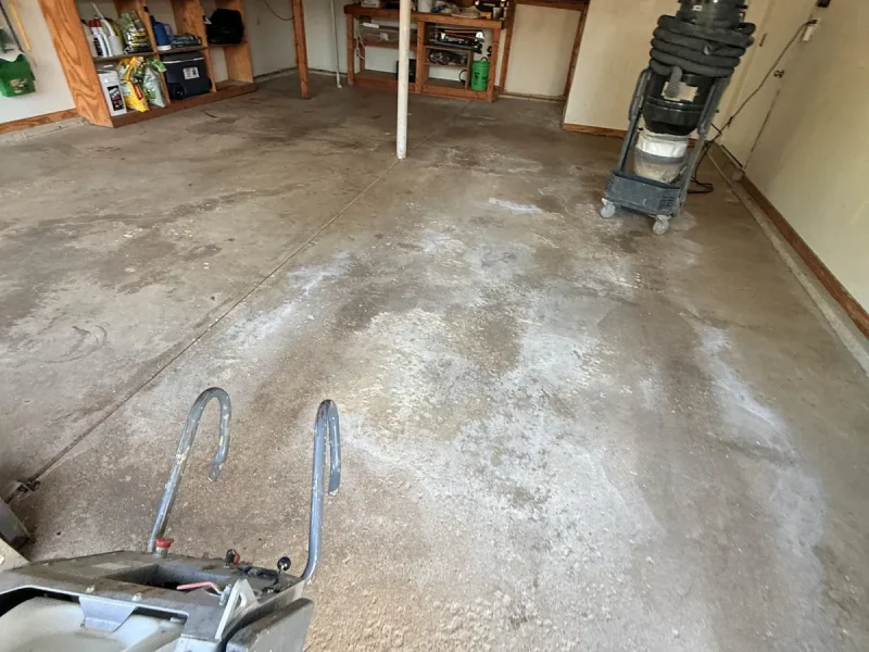 Garage floor before a Comer & Cross coating