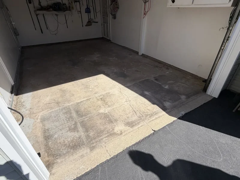 Garage floor before a Comer & Cross coating