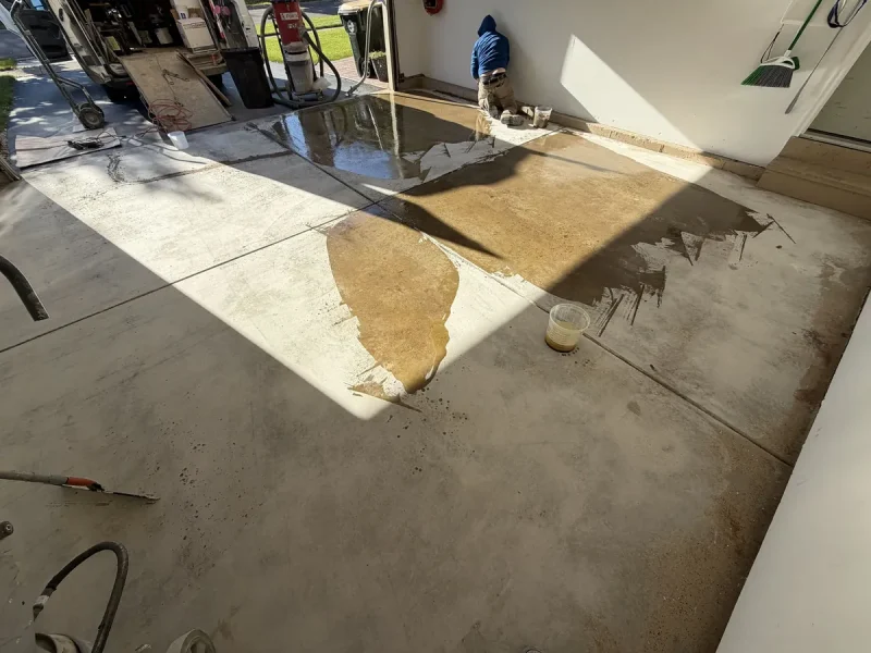 Garage floor before a Comer & Cross coating