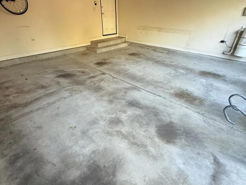 Garage floor before a Comer & Cross coating