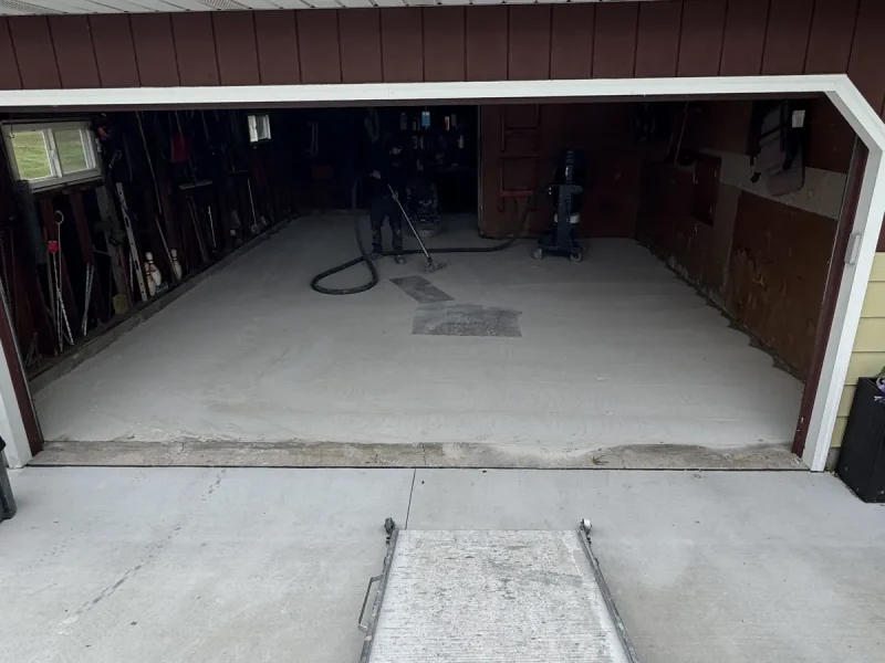Garage floor before a Comer & Cross coating