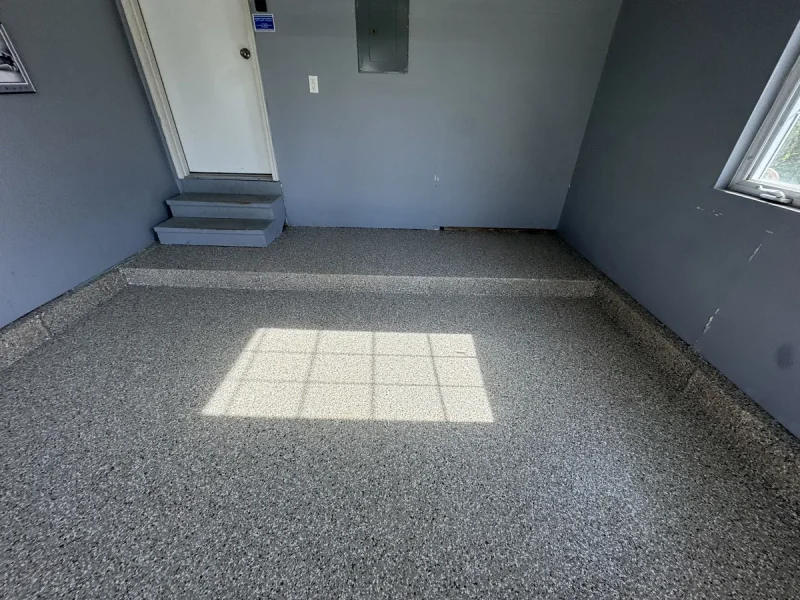 The same garage floor after a Comer & Cross coating