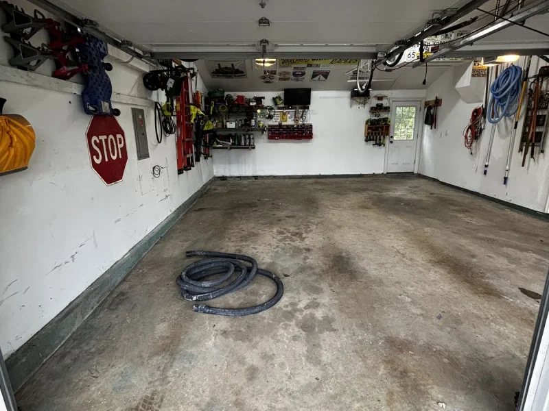 Garage floor before a Comer & Cross coating