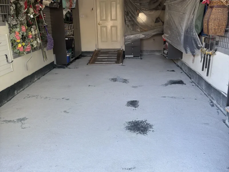 Garage floor before a Comer & Cross coating